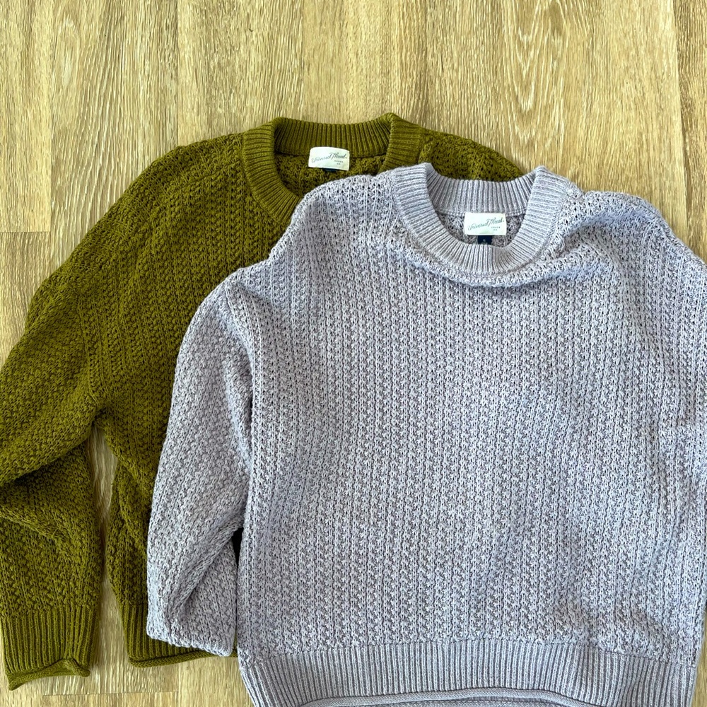 2 Universal Threat knit sweaters